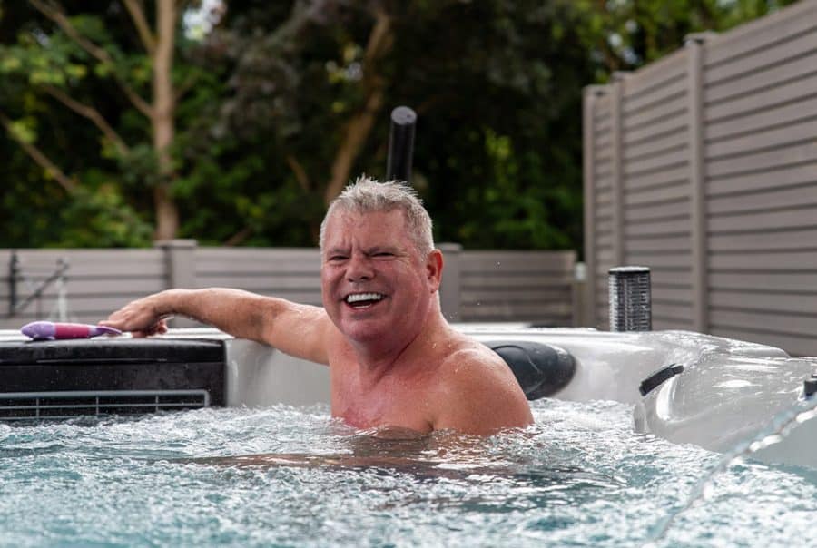 happy customer in a swim spa