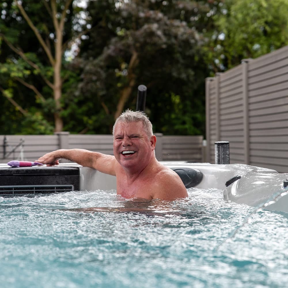 happy customer in a swim spa