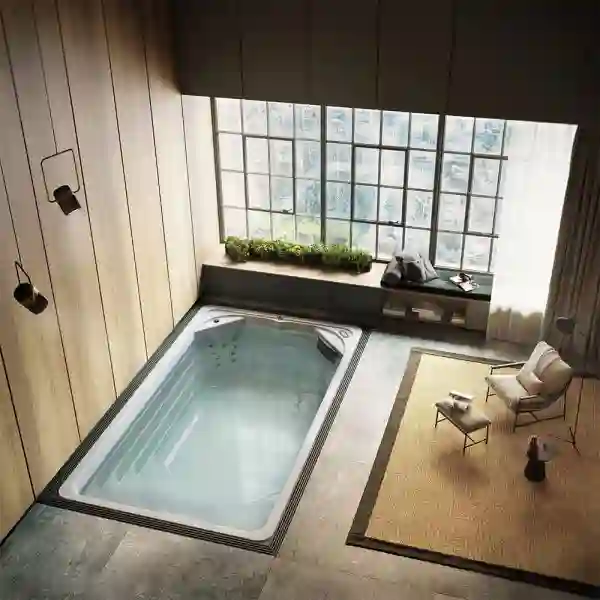 inground swim spa in a house