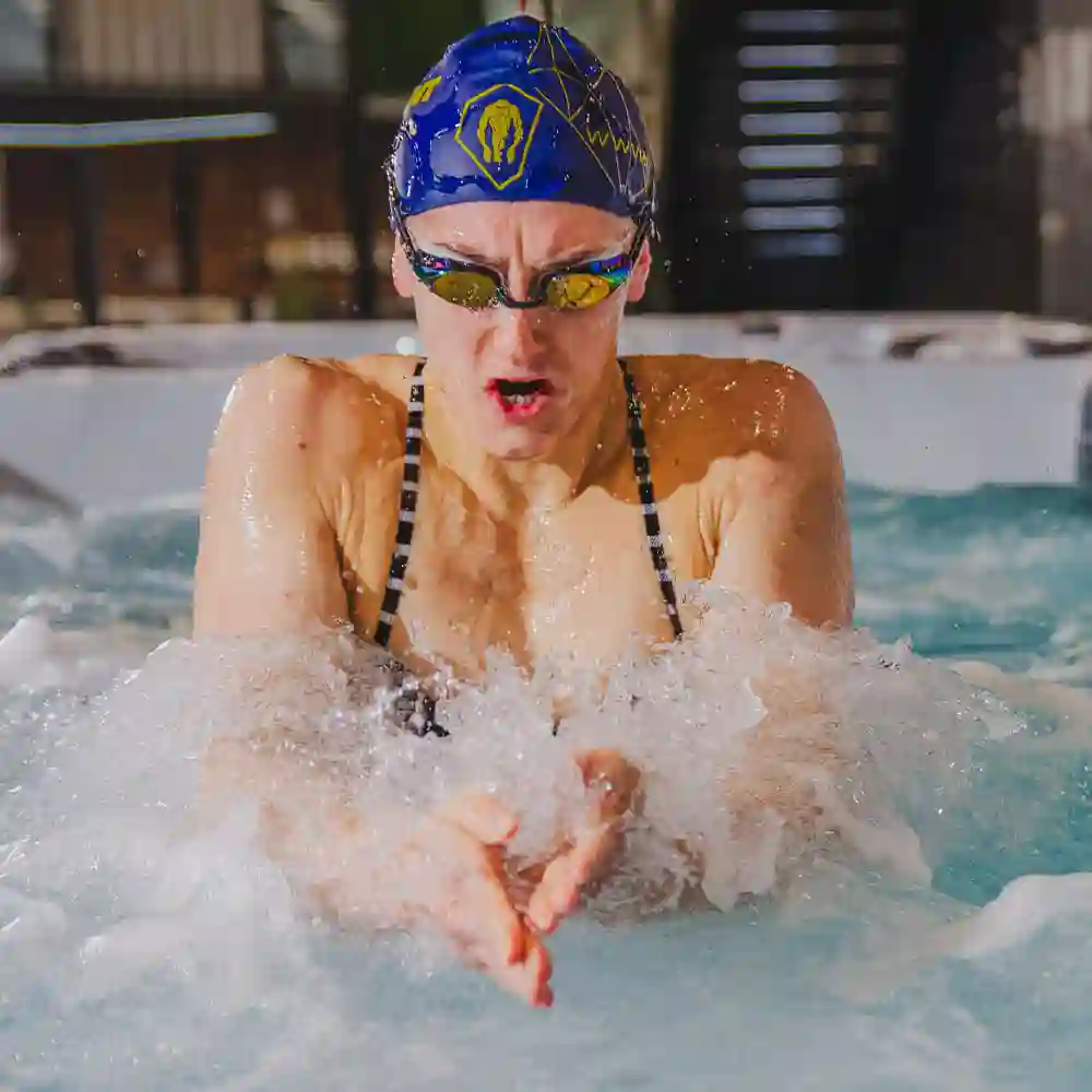 Professional swimmer training in a swim spa in West Palm Beach, South Florida